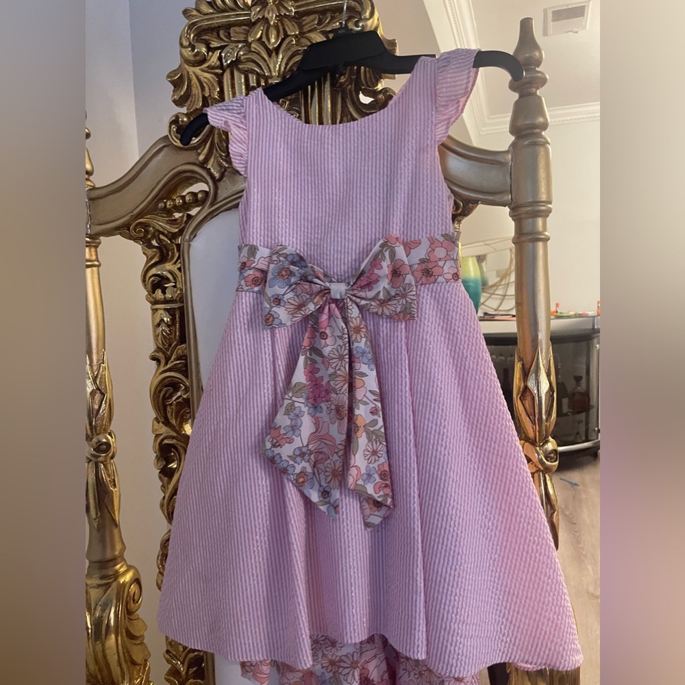 Rare editions bow inside floral dress
